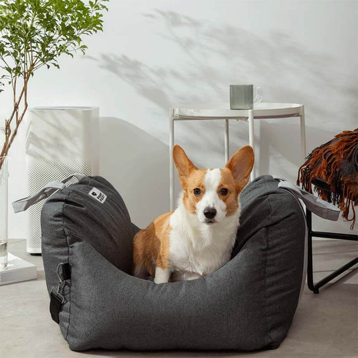 Dog travel booster seat, grey with plaid pattern, stylish and functional pet accessory.