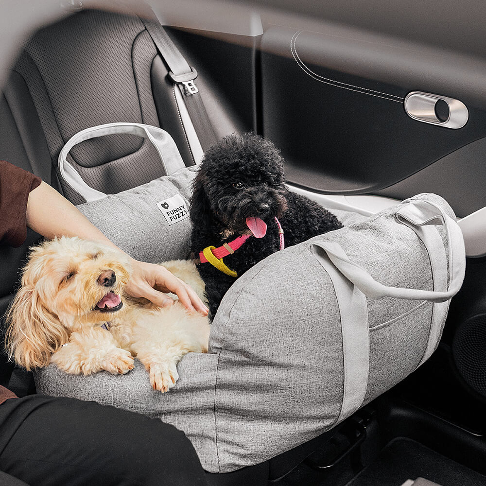 Dog car seat for safe travel, robust frame, protects pet during sudden stops.
