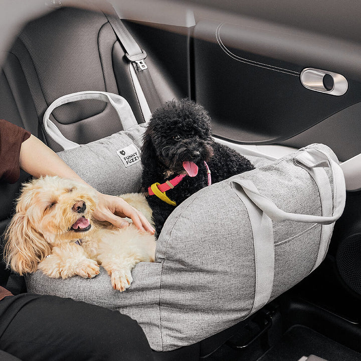 Dog car seat for safe travel, robust frame, protects pet during sudden stops.