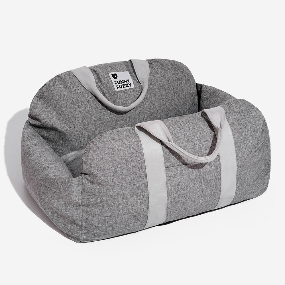 Small dog booster seat, brown faux fur, cozy and secure for car travel.