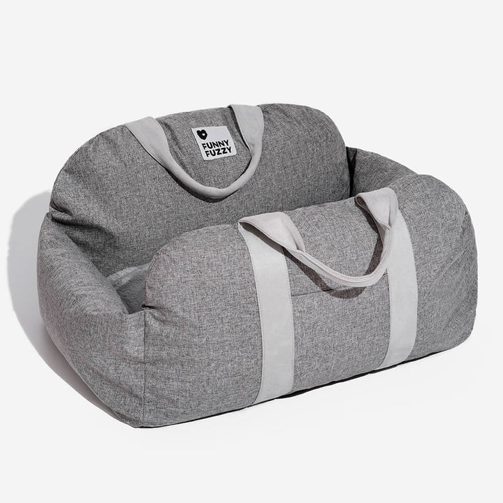 Small dog booster seat, brown faux fur, cozy and secure for car travel.