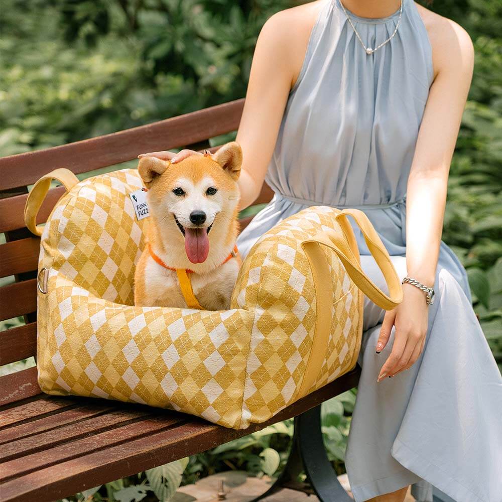 Dog car seat booster, tan, blends with car interior, stylish pet accessory.