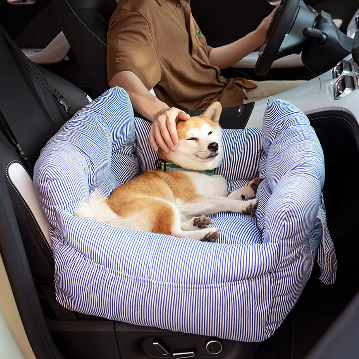 Travel safety pet car seat, secures pet into place, minimizes motion.