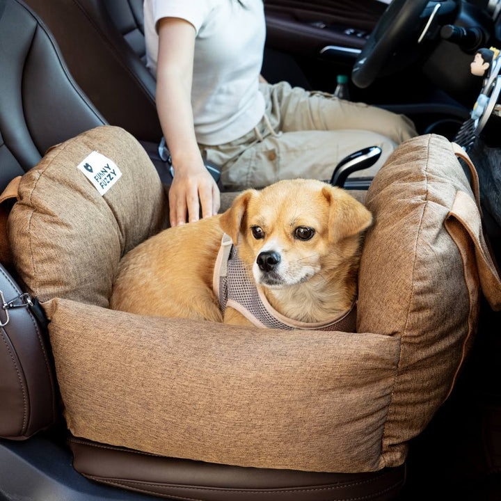 Comfortable pet travel seat, elevated base, reduces car sickness.