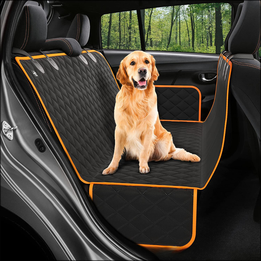 Happy dog resting on a car seat extender, demonstrating safe and comfortable car travel