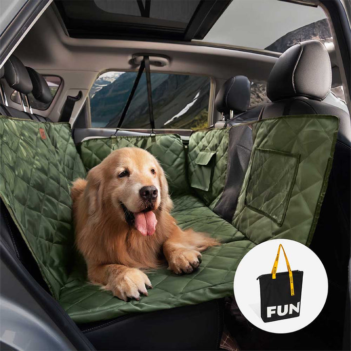 Dog car seat extender by camping gear, indicating its versatility for outdoor trips.