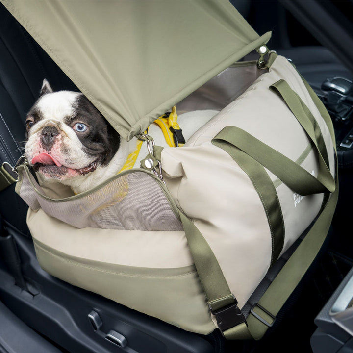 Portable dog car seat accessory, sun shade for safer pet travel.
