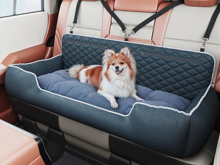 Dog car seat travel bed with storage pockets, providing comfort and vehicle safety for pets, portable design.