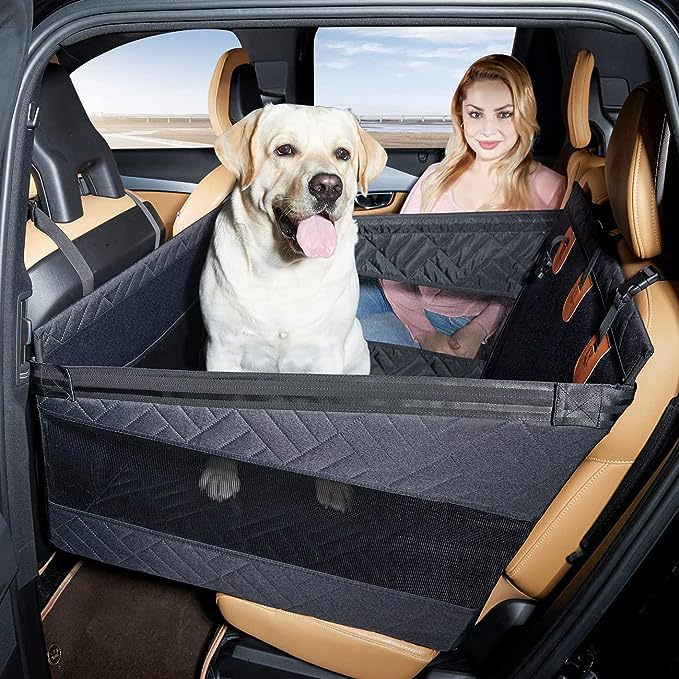 Dog car seat with hard floor & high sidewalls for safe pet travel, easy to clean.