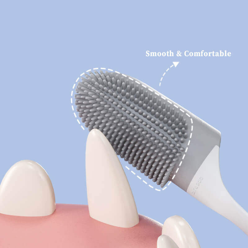 Hand demonstrating use of a finger toothbrush on a dog's teeth for effective pet oral care