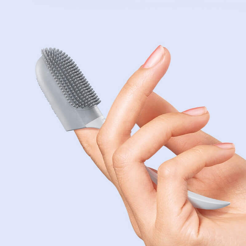 Packaging of a dog & cat finger toothbrush highlighting pet dental care and easy cleaning