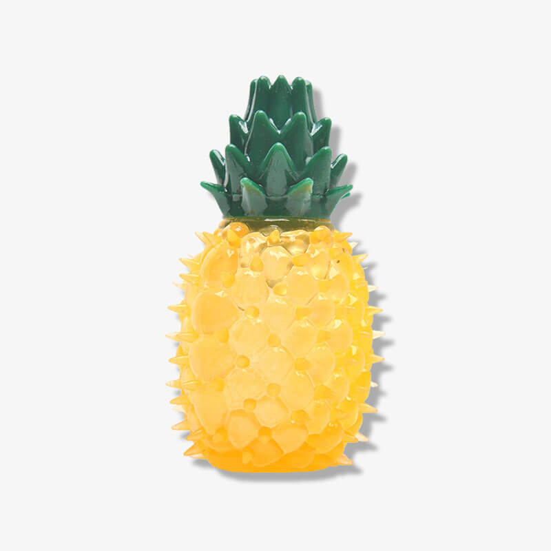 Yellow water-filled frozen fruit dog toy, an enrichment chew toy ideal for cooling pets.
