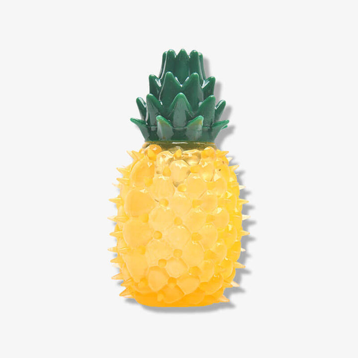 Yellow water-filled frozen fruit dog toy, an enrichment chew toy ideal for cooling pets.