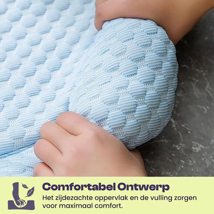 Easy-clean, scratch-resistant dog bed with a silk cooling mat and plush edges.