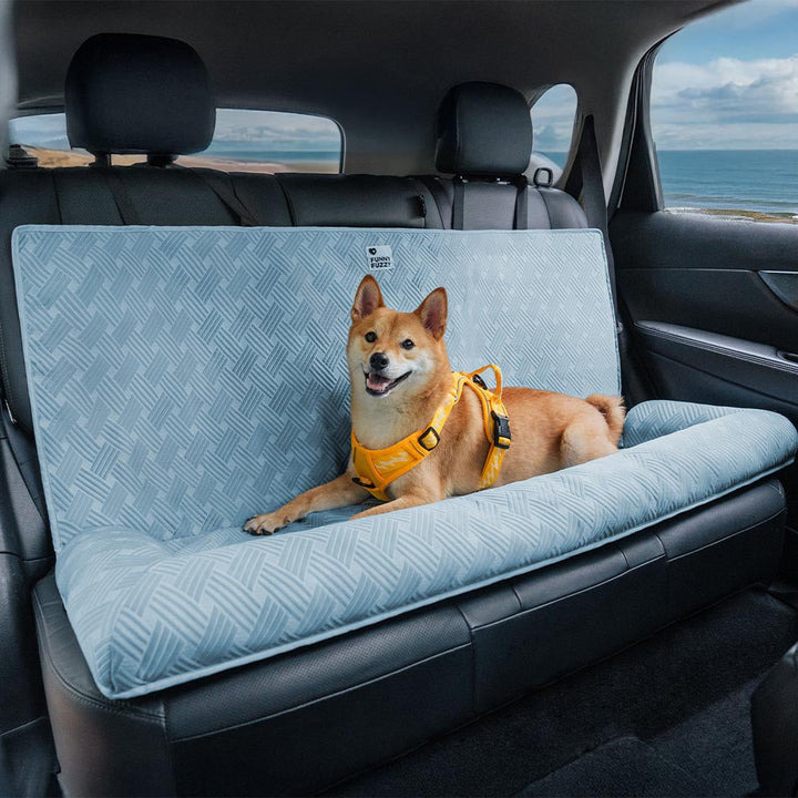 Dog Cooling Travel Bolster Car Seat Bed in a car, showing a happy large dog enjoying the ride safely.