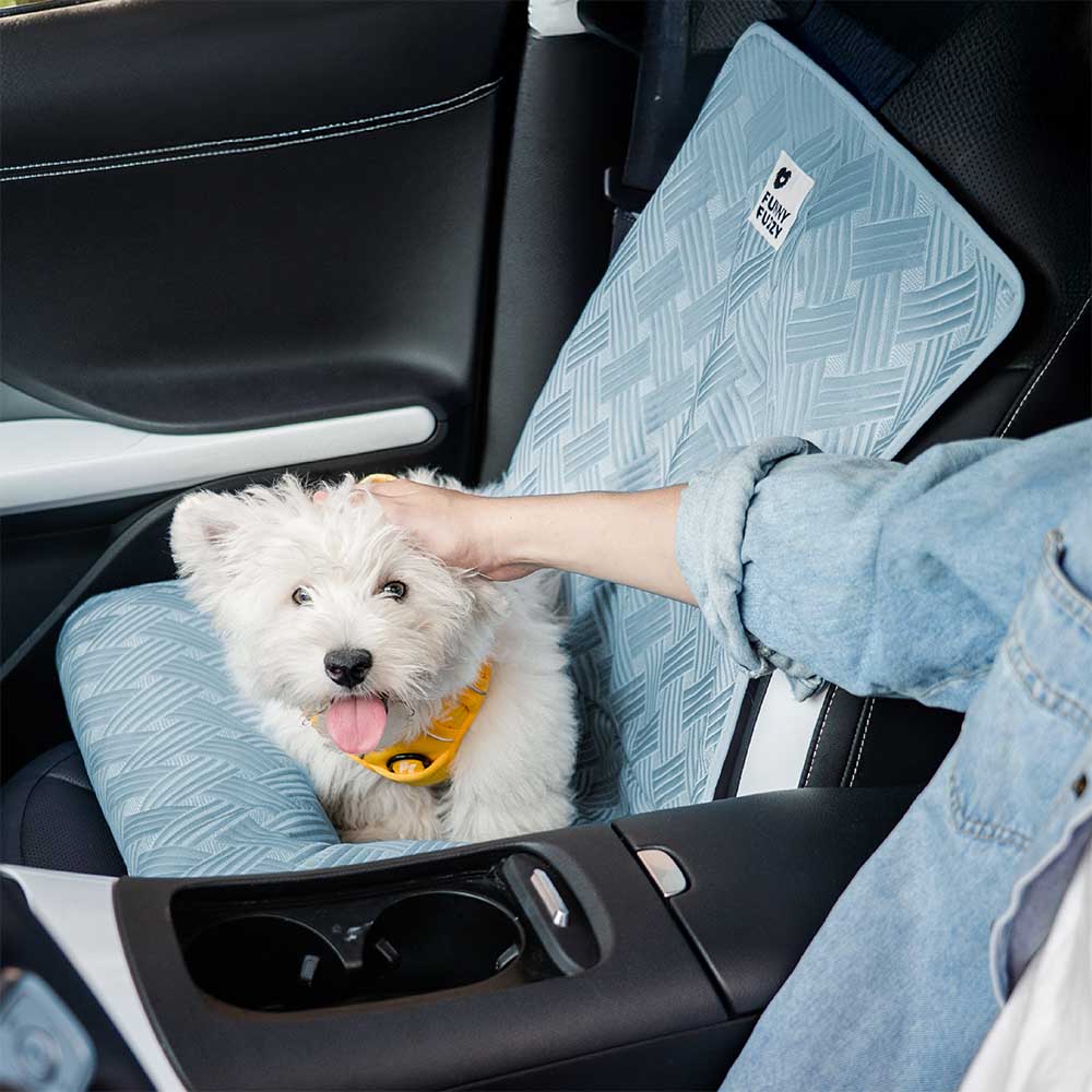 Dog car seat bed in a backseat configuration, illustrating easy installation and a secure canine travel environment.