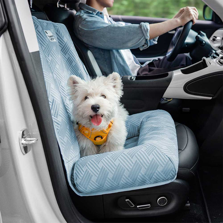 Promotional image of the Dog Cooling Travel Bolster Car Seat Bed, highlighting its washable feature for easy cleaning.