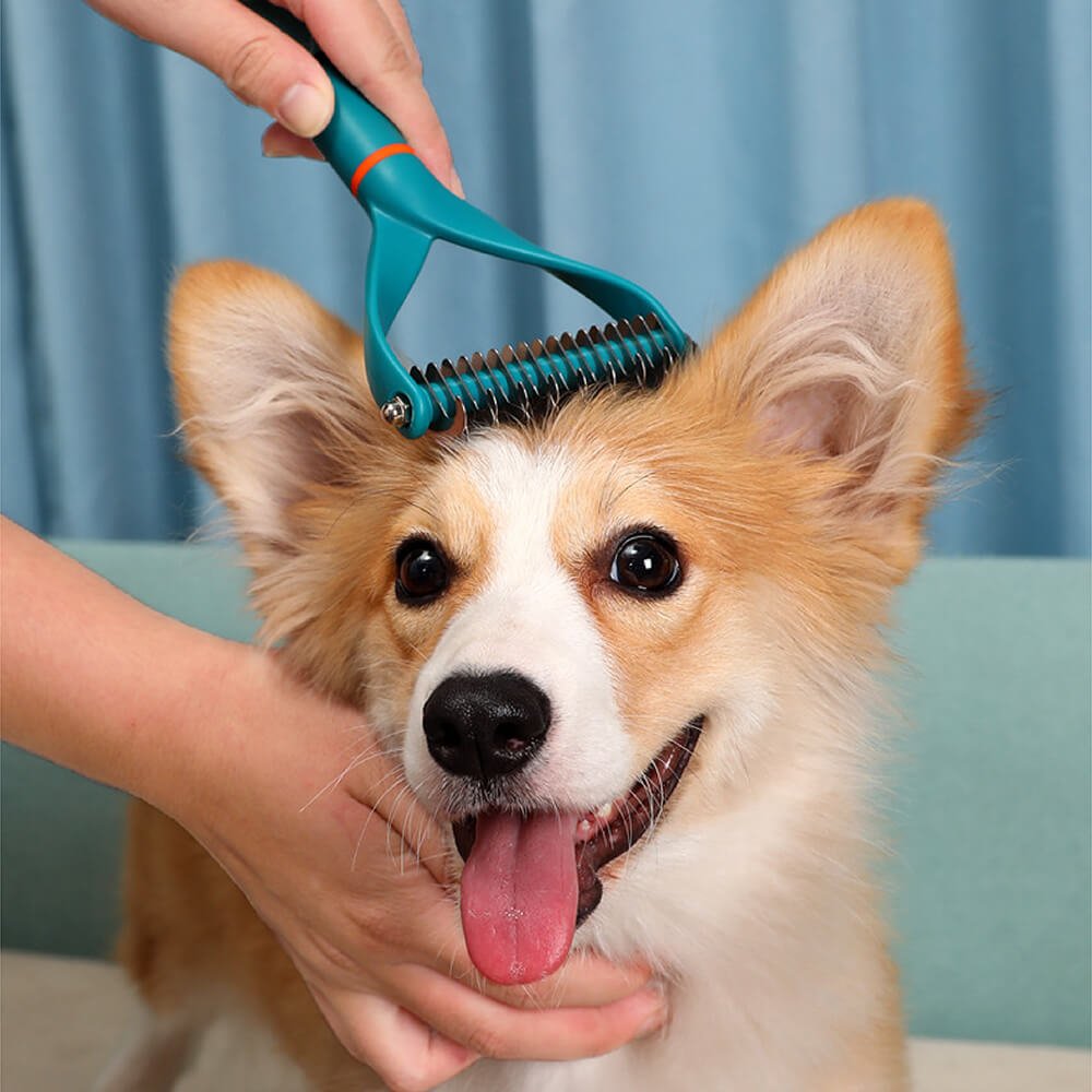 Pet dematting comb with sturdy double blades, perfect for removing mats and tangles from dog fur.