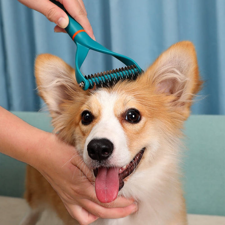 Pet dematting comb with sturdy double blades, perfect for removing mats and tangles from dog fur.