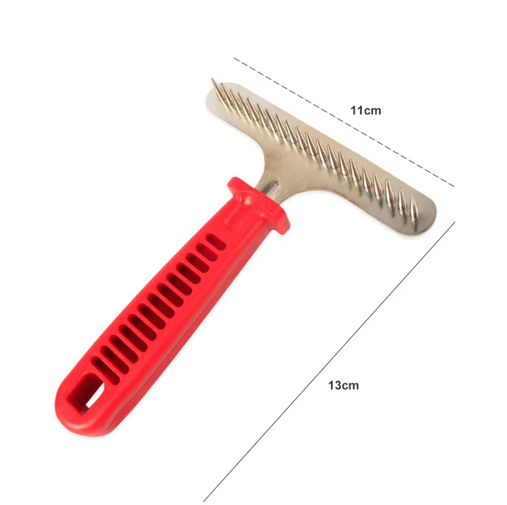 Pet care tool: red handle dematting rake for effective fur removal on large dogs