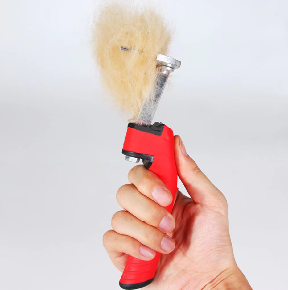 Heavy duty dematting rake with red handle, perfect for large dogs with thick fur