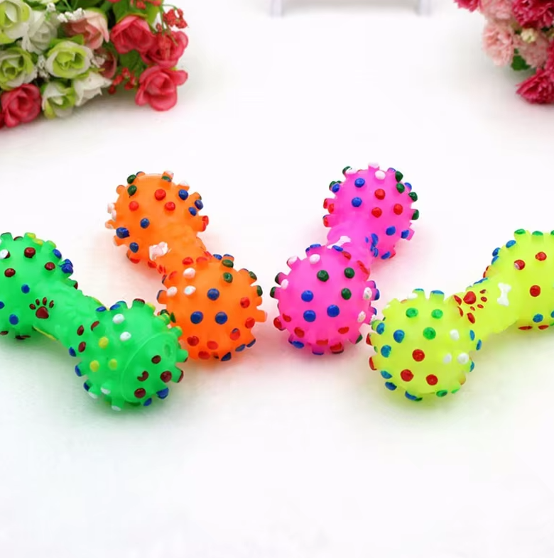 Vibrant dog chew toy, dumbbell shape, made for dental care and interactive play.