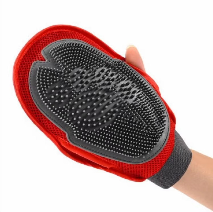 Ergonomic black dog bath glove, a gentle massage brush for pet grooming and animal care.