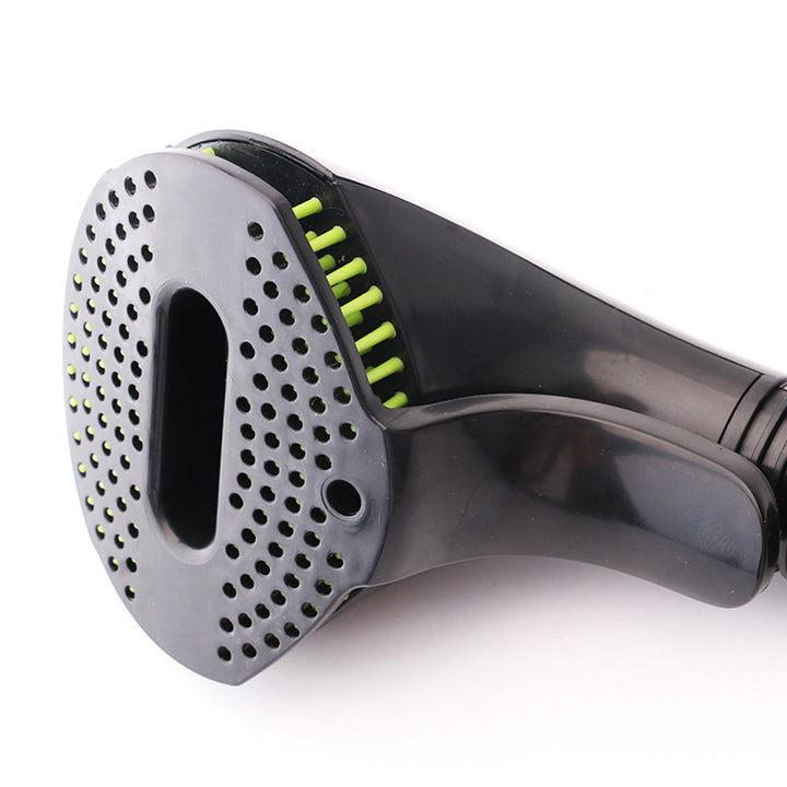 Close-up of a dog grooming brush, highlighting its detangling bristles and comfortable grip for effective animal grooming.