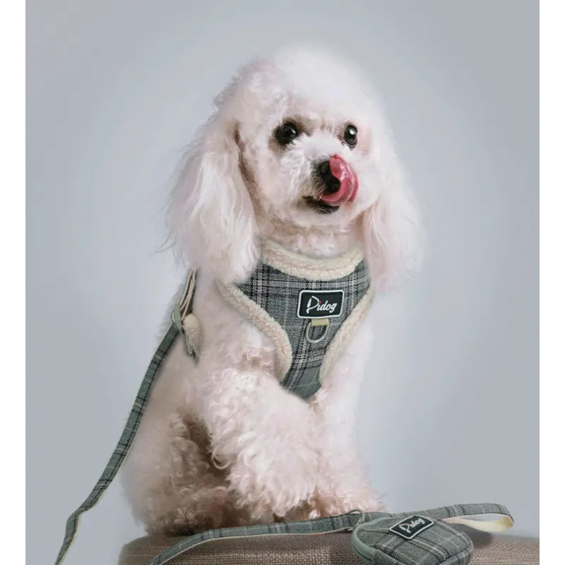 Pet supplies: Checked dog harness and leash set with integrated waste bag dispenser, perfect for small and medium dog breeds.