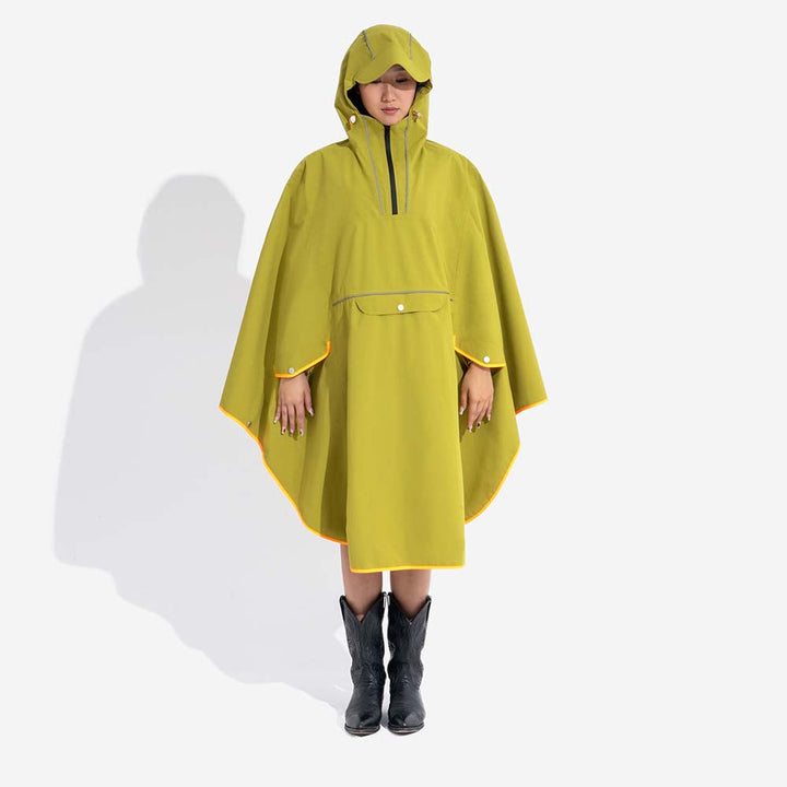 Human hands demonstrating the adjustable drawstring on the hood of a matching waterproof raincoat, comfort