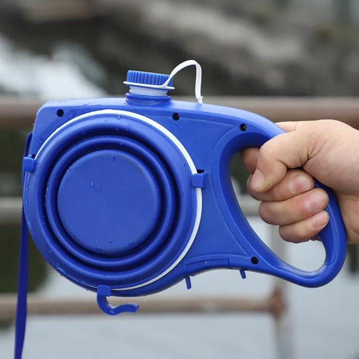 Compact pet accessory: dog leash featuring integrated water dispenser & collapsible bowl for outdoor use