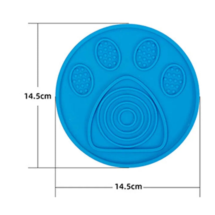Pet grooming aid: silicone dog lick mat for wall mounting, holds treats to distract dog.
