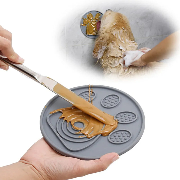 Blue dog lick mat with suction cups, ideal pet supply for calm bath times and nail trims.