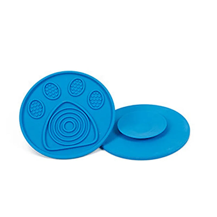 Innovative pet grooming accessory: dog lick mat with suction to keep dogs busy with treats.