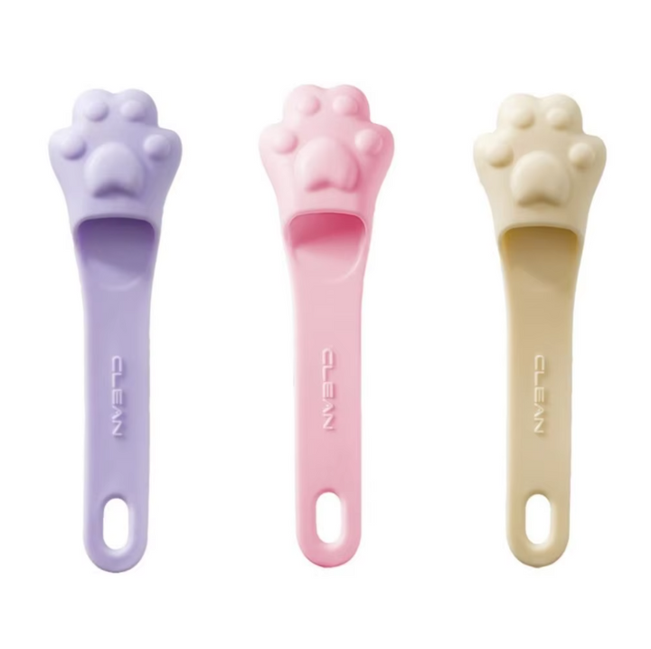 Innovative paw design dog tongue scraper, enhancing pet oral hygiene routine