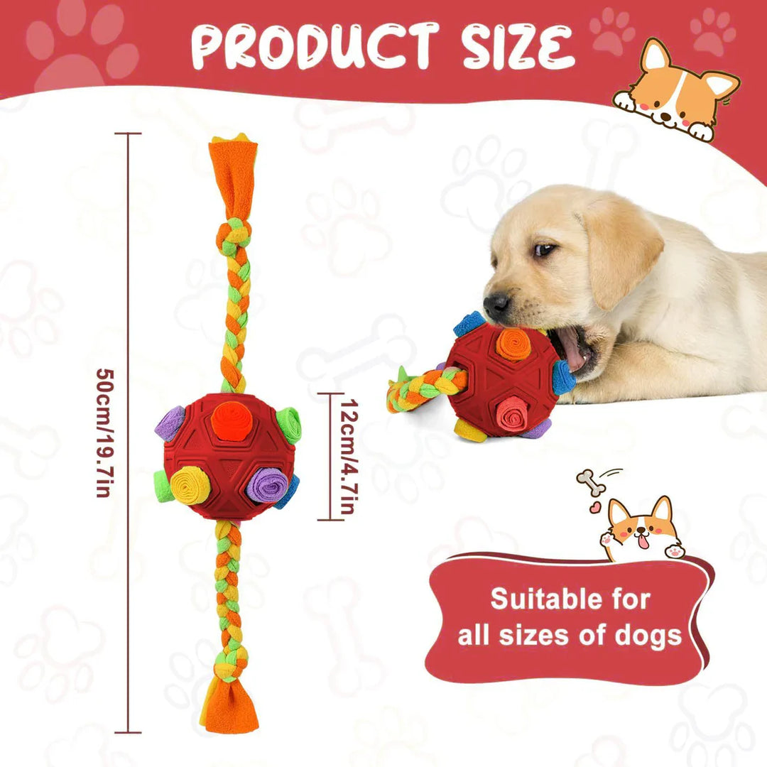 Playful puppy using an interactive snuffle ball during mental enrichment play time