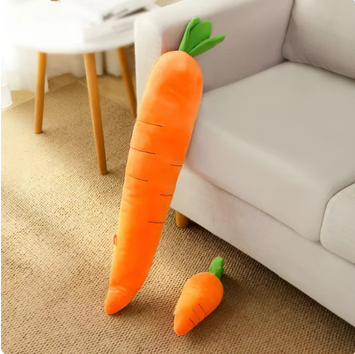 Interactive dog toy, orange plush carrot with green leaves, squeaky for engaging fun.