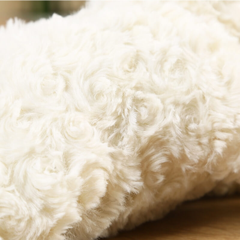 Textured white plush lamb dog toy with an internal squeaker, an interactive pet accessory