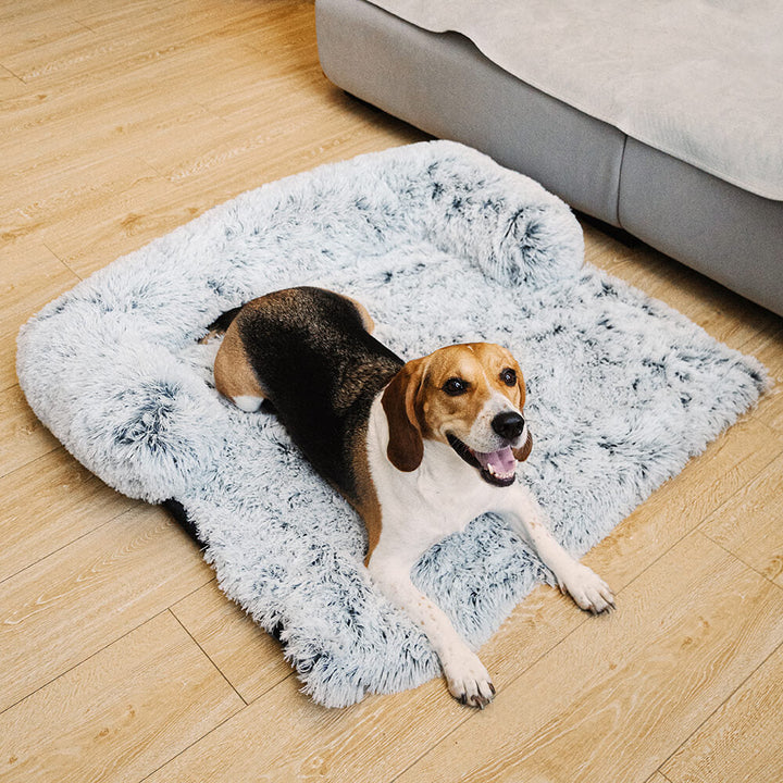 Close-up of the soft, washable faux fur fabric of a pet furniture protector and dog bed