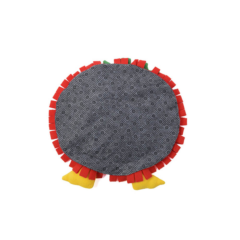 Puppy exploring a vegetable-themed snuffle mat, petplay dog accessory