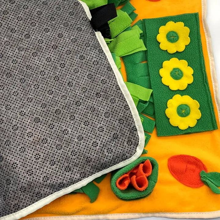 Interactive dog snuffle mat with dense fleece strips, used as a slow feeder bowl for puppies
