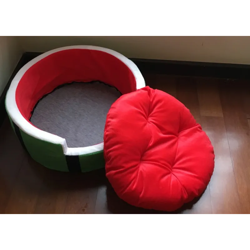 Close-up of watermelon dog bed fabric, showing vibrant colors and plush texture