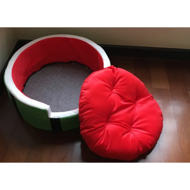 Close-up of watermelon dog bed fabric, showing vibrant colors and plush texture