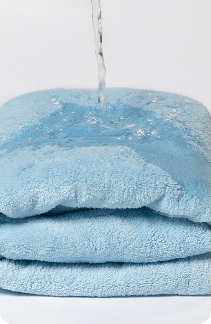Machine washable dog quick dry pet towel, neatly folded to show its compact storage.