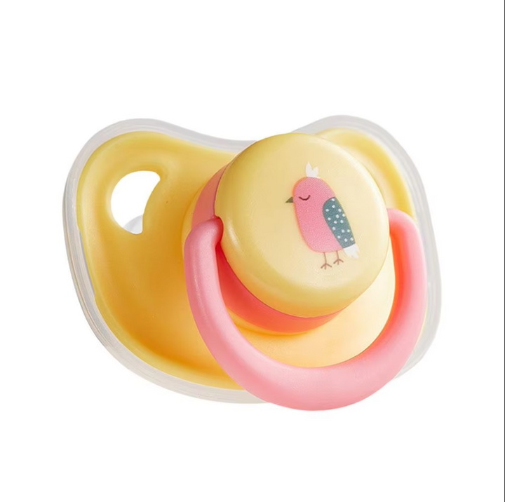 Yellow rubber dog chew dummy for small to medium breeds, long-lasting pet toy