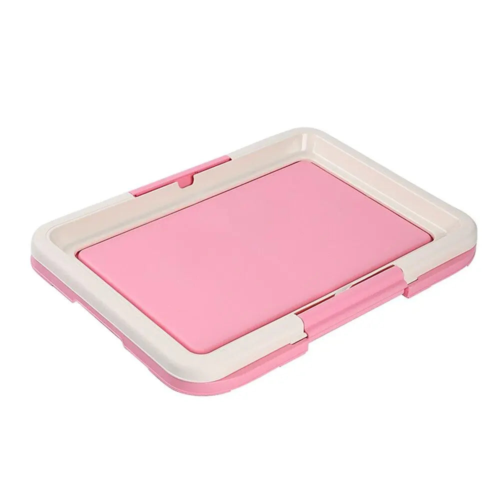 Portable indoor pet potty for small dogs with a non-slip mat, making clean up easy.