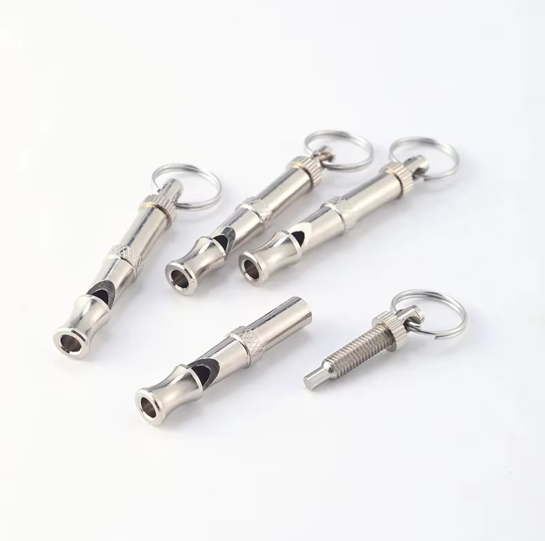 Ultrasonic dog whistle for recall training, small and lightweight pet accessory for obedience.