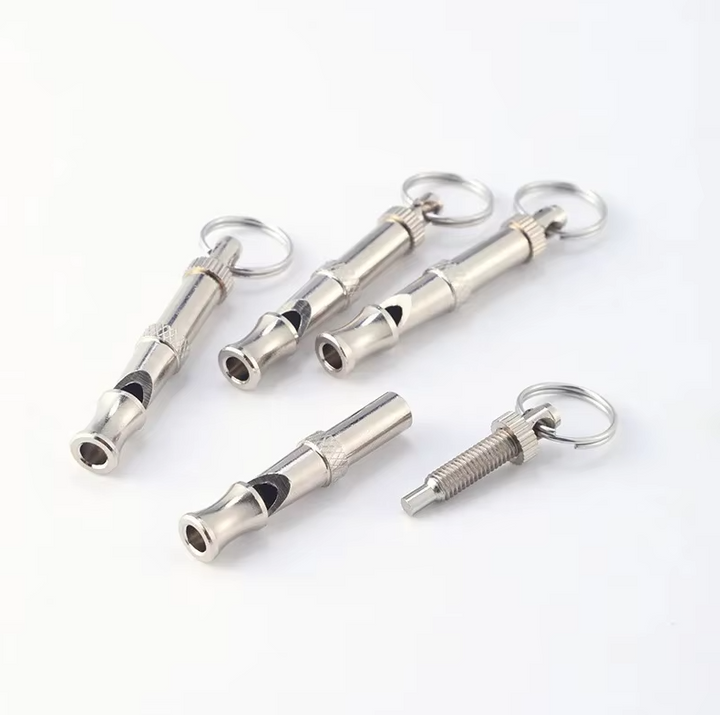 Ultrasonic dog whistle for recall training, small and lightweight pet accessory for obedience.