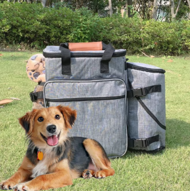 Dog travel bag in car seat, organized with food and toy compartments, pet travel gear.