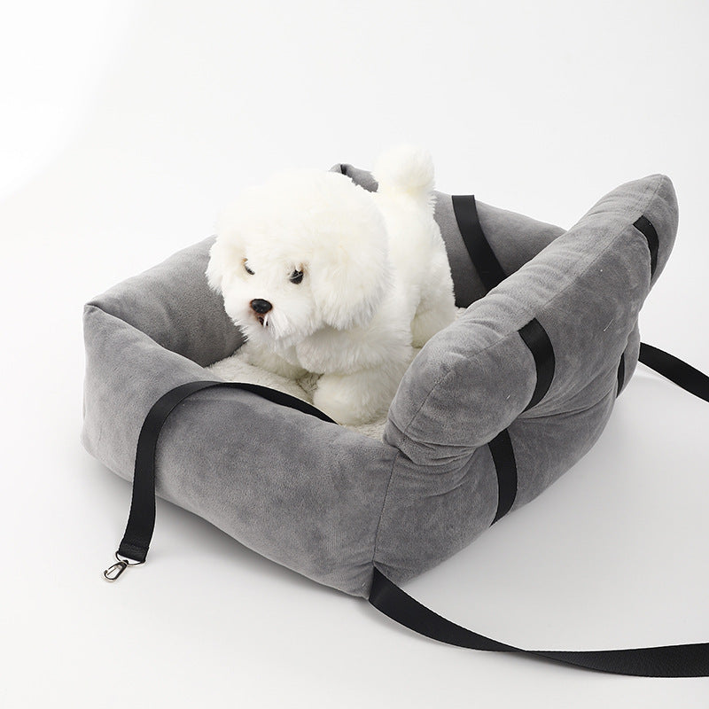 Pet travel gear: dog booster seat designed for car safety, preventing distractions while driving.
